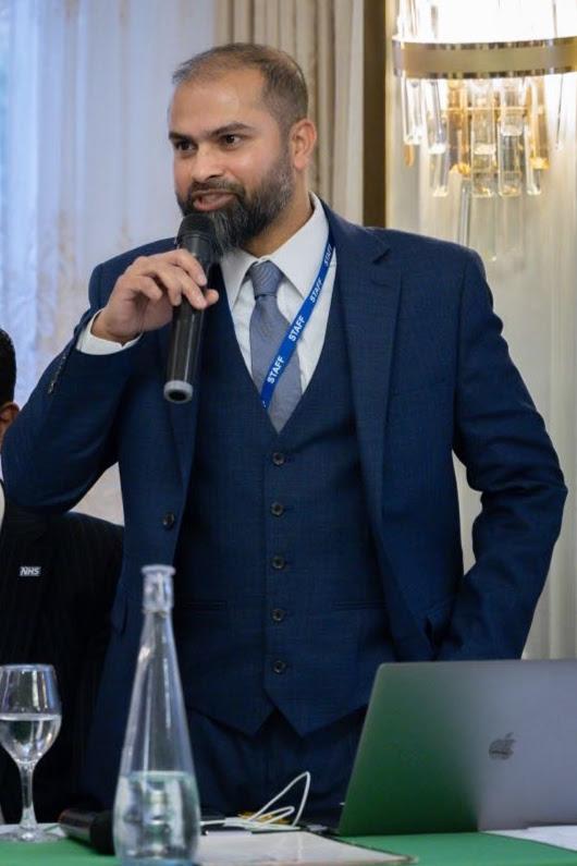 Mamun Khan speaking at an event